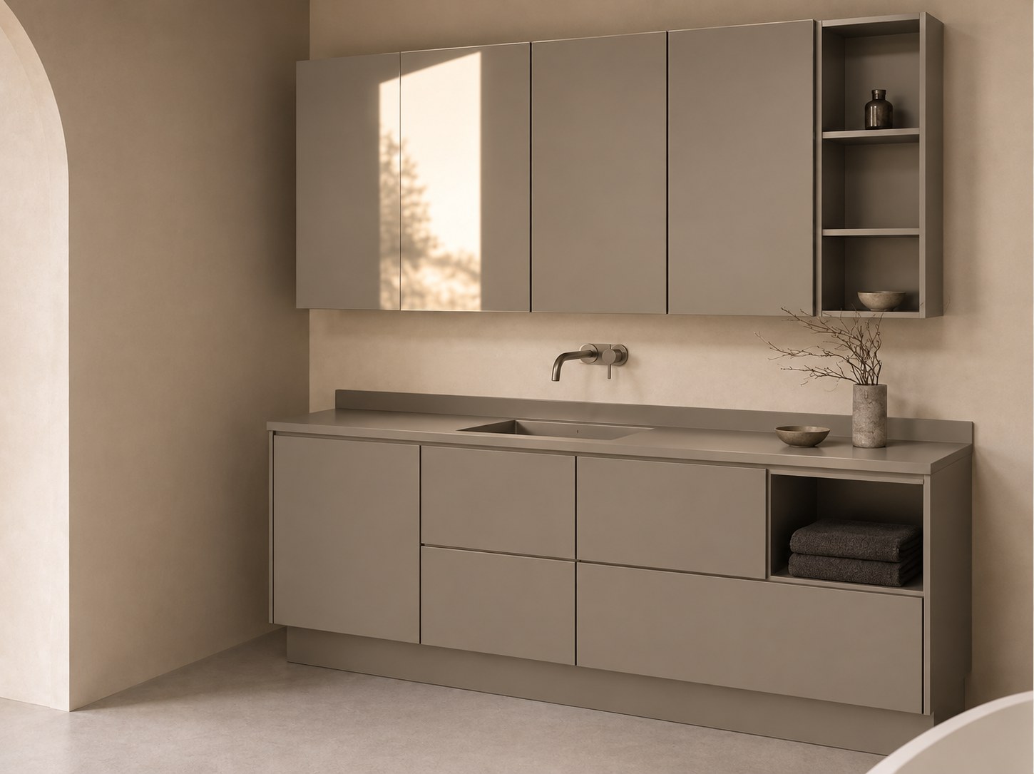 Wall-hung vanity with taupe cabinetry and mirrored uppers